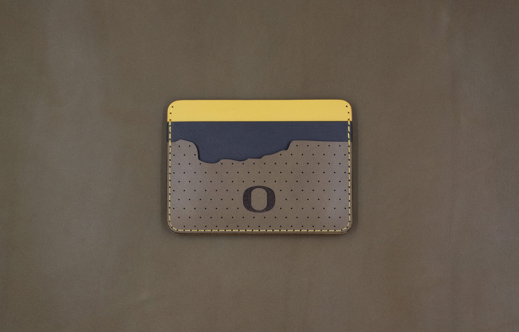 Custom University of Oregon Half Wallet with yellow, navy, and olive leather front view.
