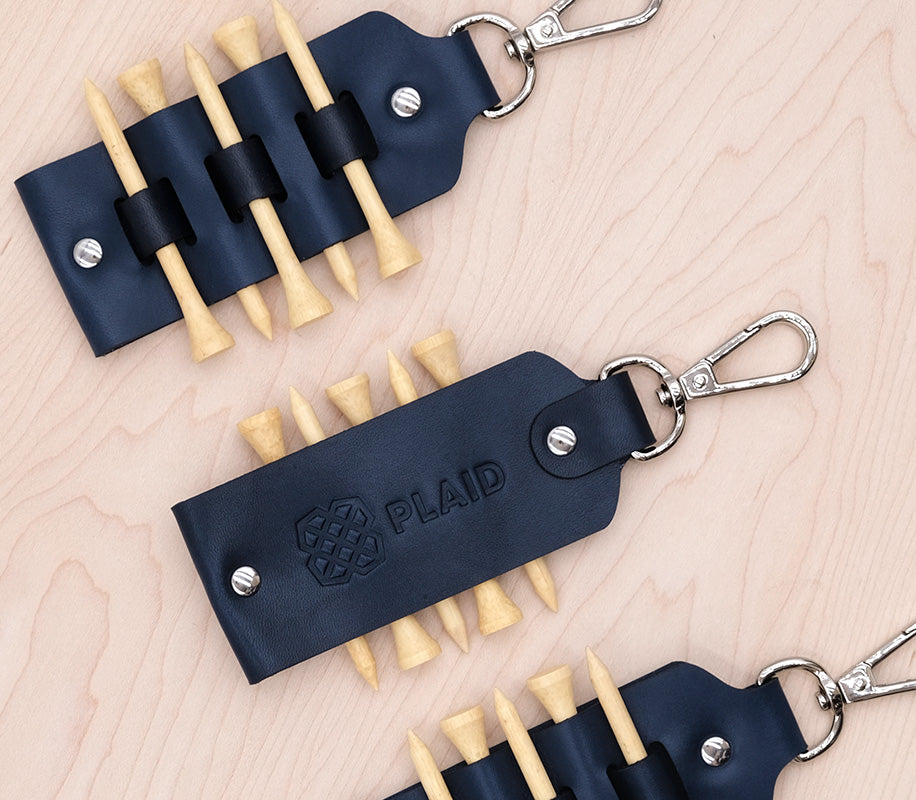 Golf Tee Tag in Navy leather with debossed logo.