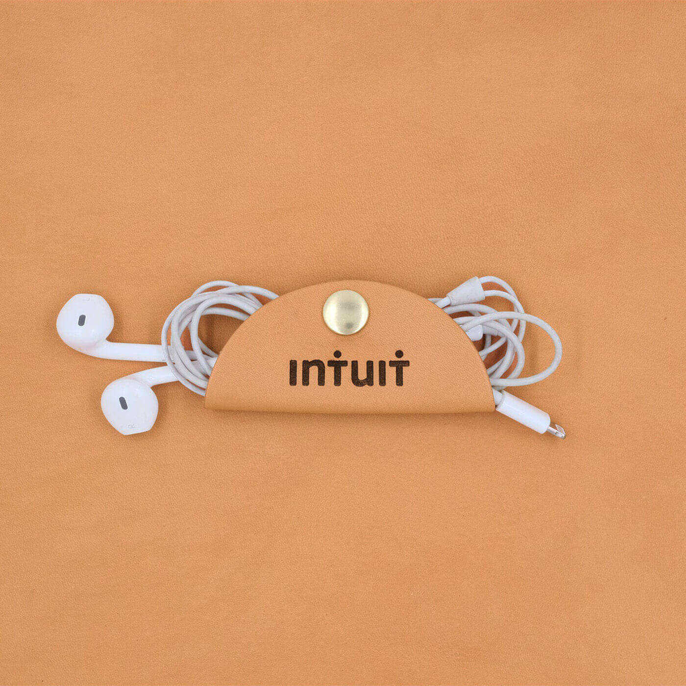 Tan leather Cord Wrap with Intuit logo