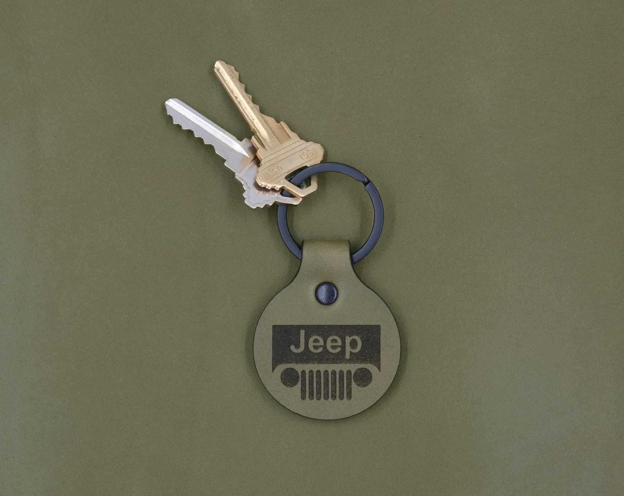 Jeep branded Tab Keychain in olive leather.