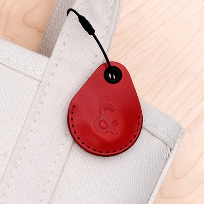 Red leather AirTag Case debossed.