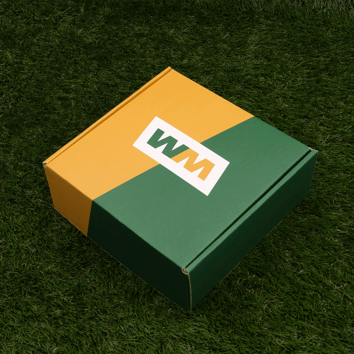 Golf Kit 1 custom box on grass, side view.
