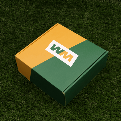 Golf Kit 1 custom box on grass, side view.
