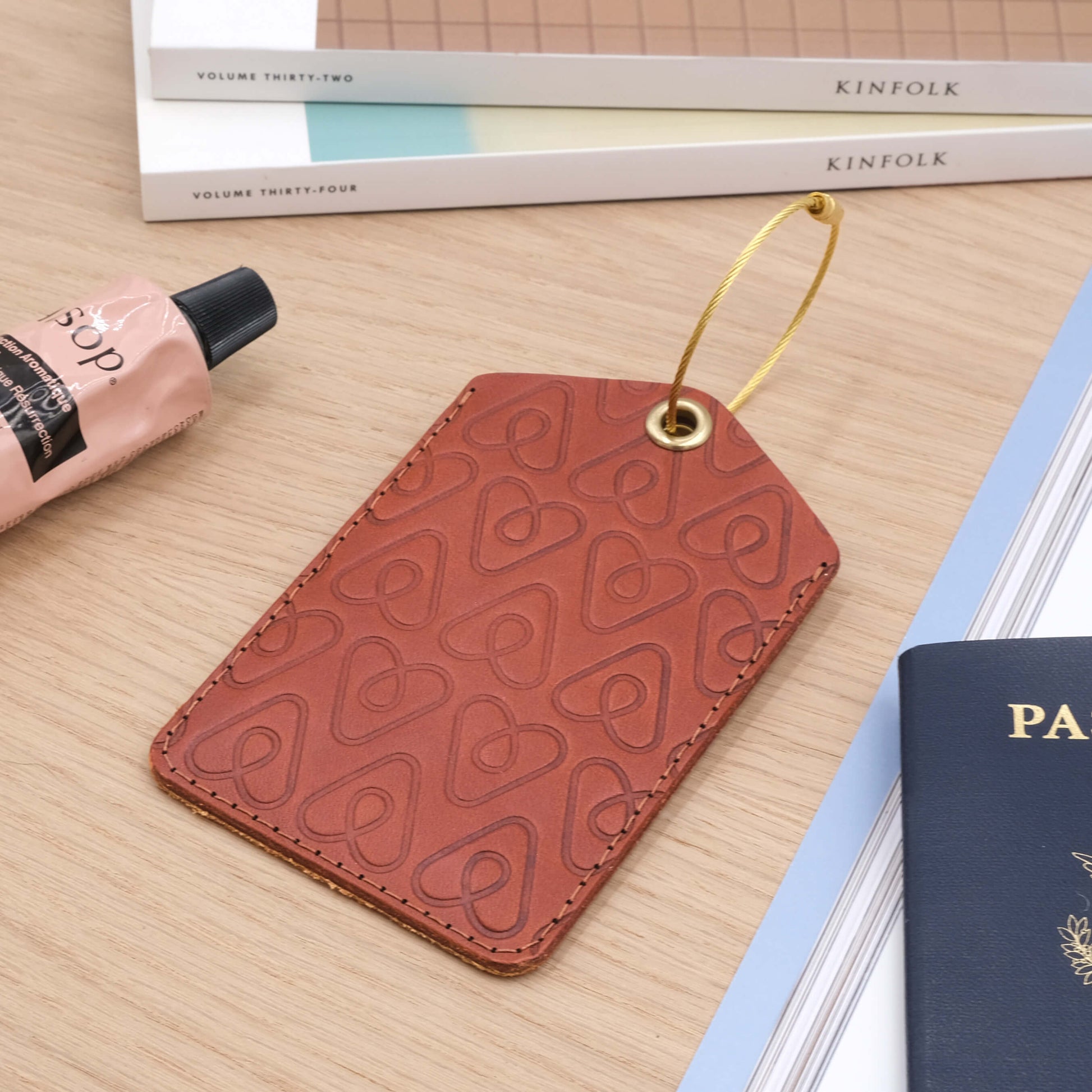 Woolly Made Executive Luggage Tag with all over debossed print.