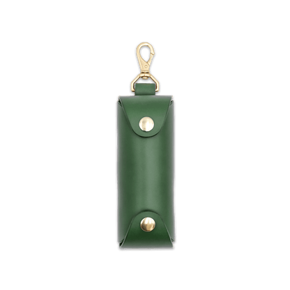 Woolly Made green leather Golf Ball Sleeve with brass hardware.