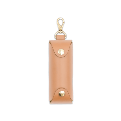 Woolly Made natural leather Golf Ball Sleeve with brass hardware.