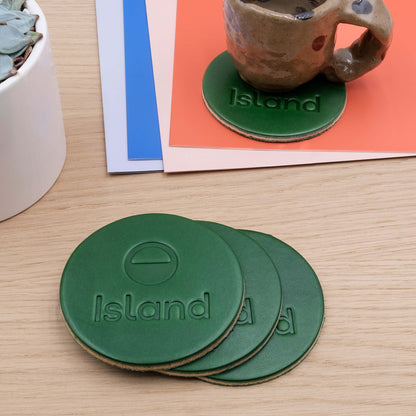 Woolly Made customized green leather debossed coasters.