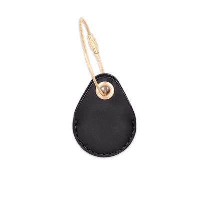 Black leather AirTag holder with brass luggage loop