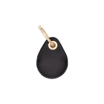 Black leather AirTag holder with brass keychain