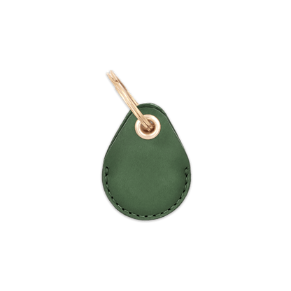 Green leather AirTag holder with brass keychain