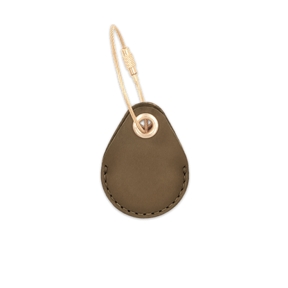 Olive leather AirTag holder with brass luggage loop