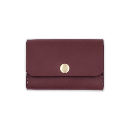 Burgundy leather with stitching, a fold, and brass snap closure.