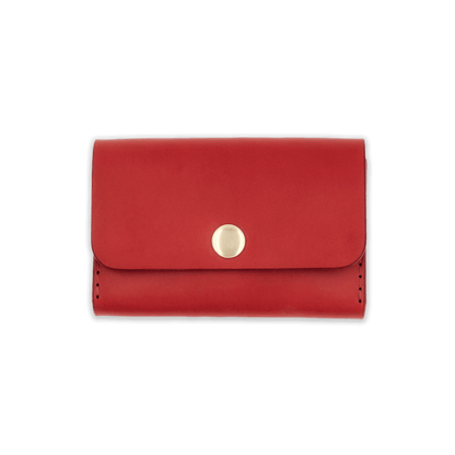 Red leather with stitching, a fold, and brass snap closure.