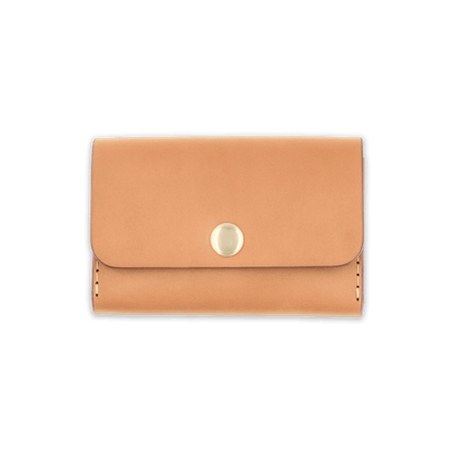 Tan leather with stitching, a fold, and brass snap closure.