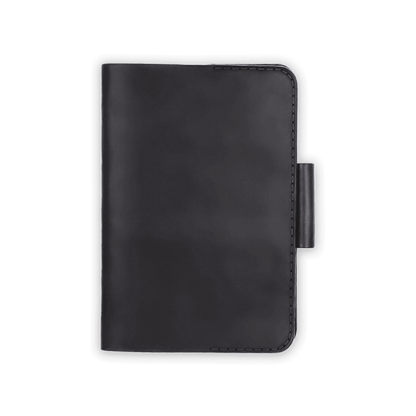 Black leather golf scorecard holder closed view with stitching and side pencil holder.