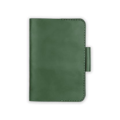 Green leather golf scorecard holder closed view with stitching and side pencil holder.