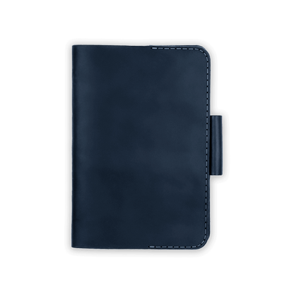 Navy leather golf scorecard holder closed view with stitching and side pencil holder.