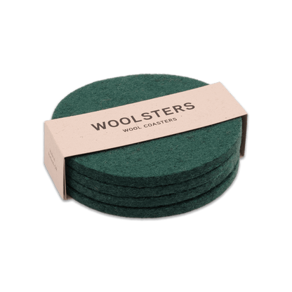 Green wool round coaster set stacked.