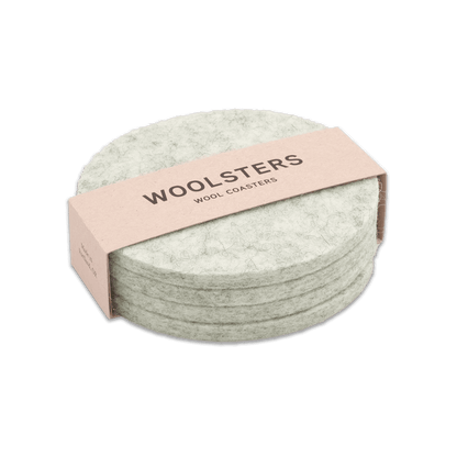 Light gray wool round coaster set stacked.