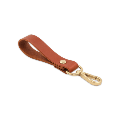 Brown leather loop with brass hardware