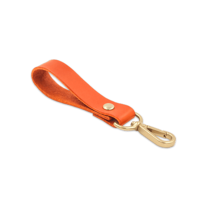 Orange leather loop with brass hardware