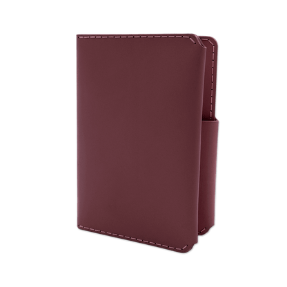 Burgundy leather passport wallet 3/4 angle view.