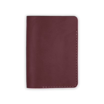 Burgundy leather Passport Cover closed view.