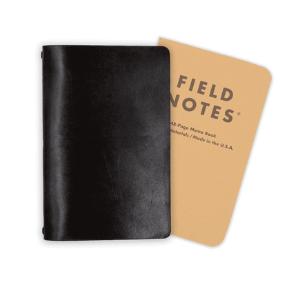 Black glazed leather journal cover closed view with Field Notes notebook.