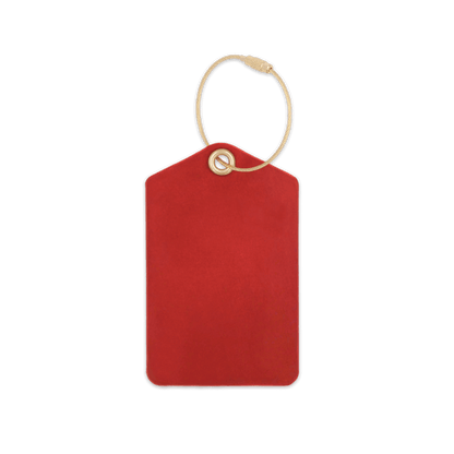 Red luggage tag with brass hardware.