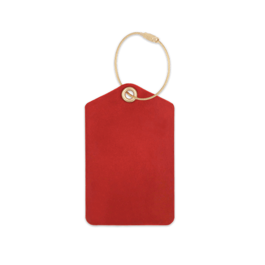 Red luggage tag with brass hardware.