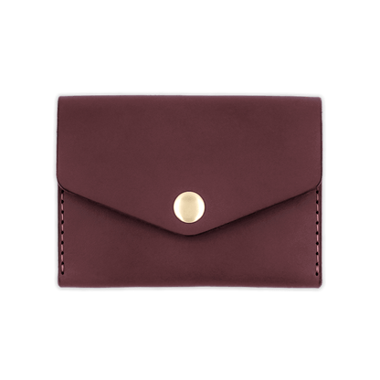 Burgundy leather Snap Wallet front view with fold closure and brass hardware.