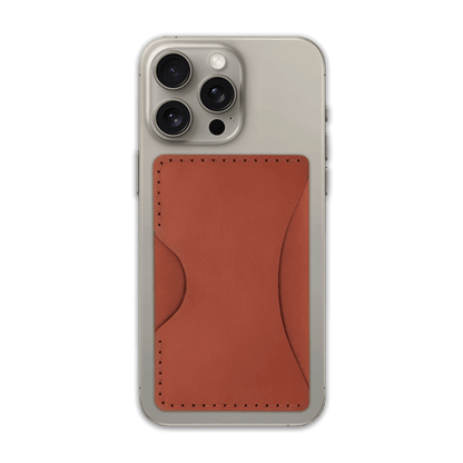 Brown leather Stick-On Wallet on iPhone.