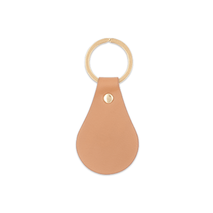 Natural leather teardrop-shaped keychain with brass hardware.