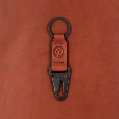 Brown leather with black hardware and Pinterest logo