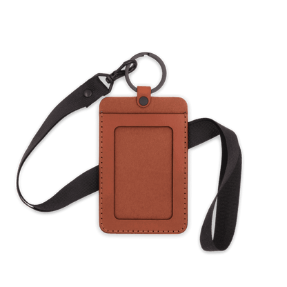 Brown leather ID Badge Holder with pocket window, black hardware, and black lanyard.