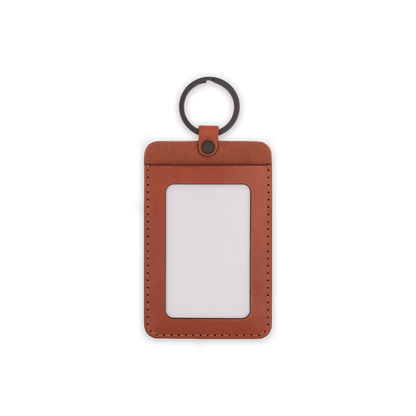 Brown leather ID Badge Holder with pocket window, white ID card, and black hardware.