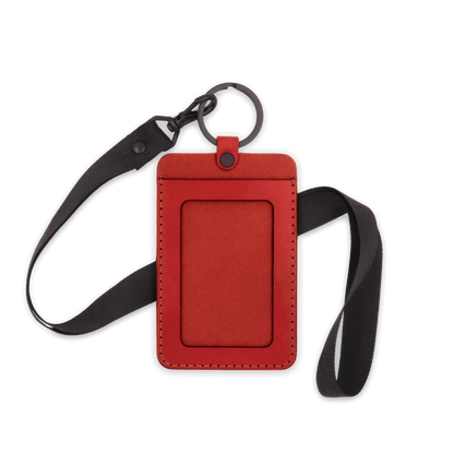 Red leather ID Badge Holder with pocket window, black hardware, and black lanyard.