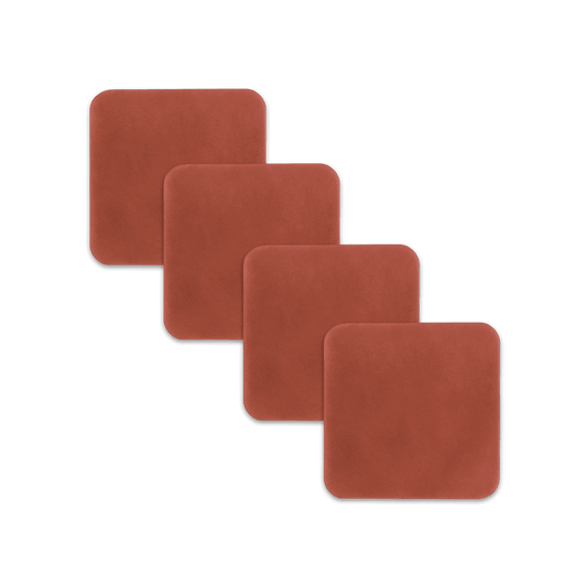 Brown square leather coasters spread out.