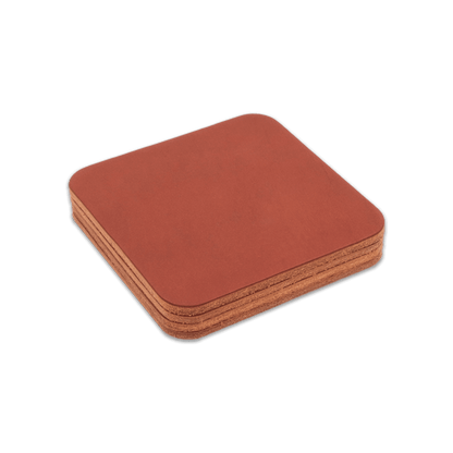 Brown square leather coasters stack.