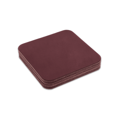 Burgundy square leather coasters stack.