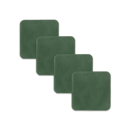 Green square leather coasters spread out.