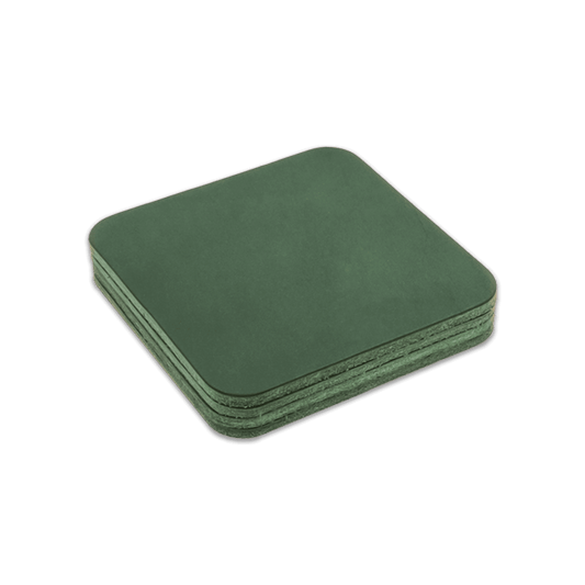 Green square leather coasters stack.