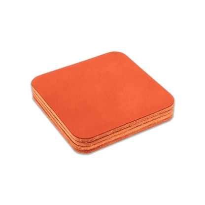 Orange square leather coasters stack.