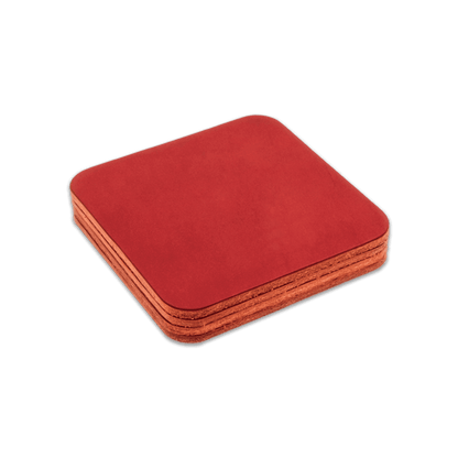 Red square leather coasters stack.