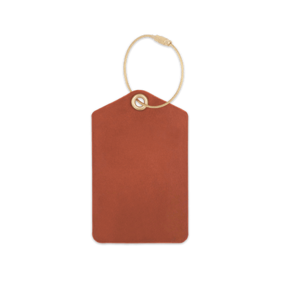Brown leather luggage tag with brass hardware.