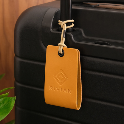 Standard Luggage Tag in gold leather with logo debossed.