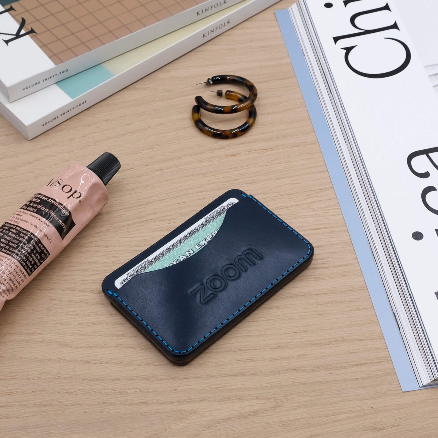 Slim Wallet with debossed brand logo.
