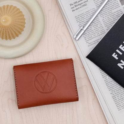 Back image of Woolly Made's Snap Wallet with a debossed logo.