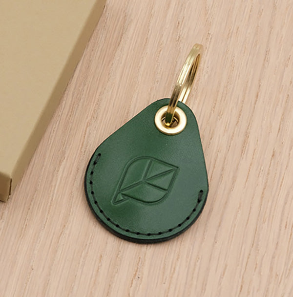 AirTag Case Keychain in green leather.