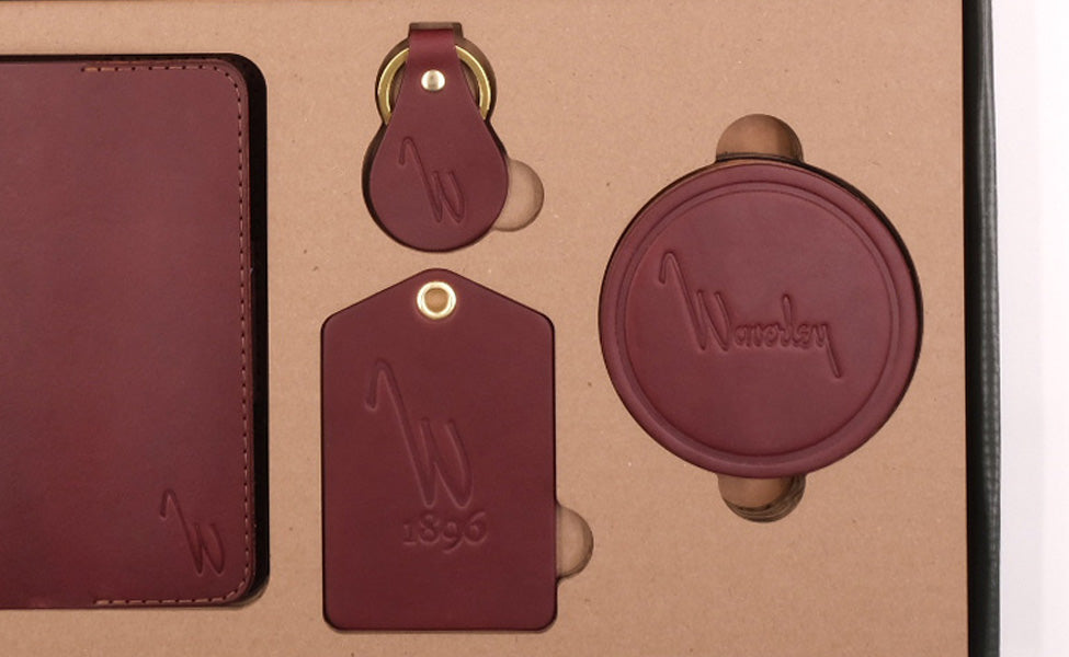 Waverley branded Golf Scorecard Holder, Tab Keychain, Simple Bag Tag, and Coasters in Burgundy leather.